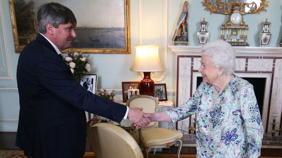 Queen Elizabeth II presents Simon Armitage with The Queen's Gold Medal for Poetry upon his appointment as Poet Laureate during an audience at Buckingham Palace on May 29, 2019