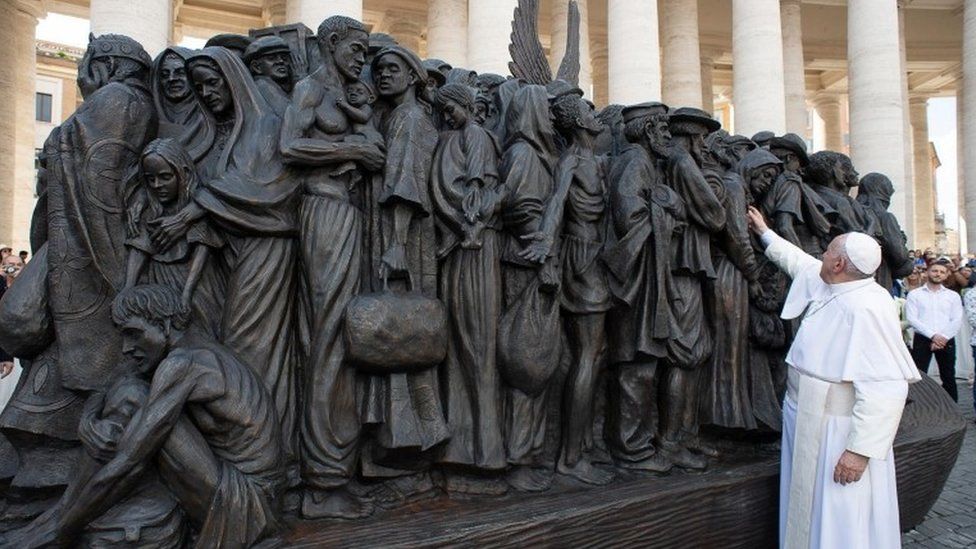 Pope Francis inspects the sculpture in St. Peter's Square