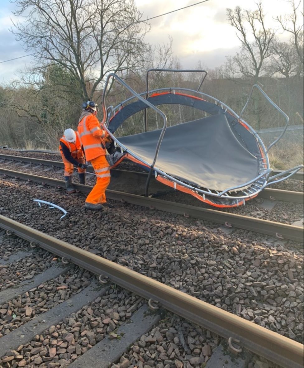 Trampoline near train tracks