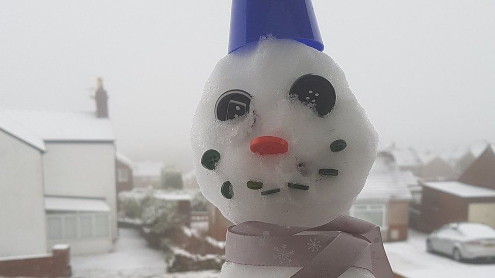 A snowman in Coedpoeth, Wrexham