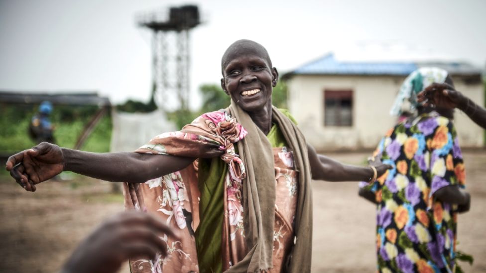 Women dancing and celebrating the removal of mines by the UN in Canal Village, Jonglei state, South Sudan