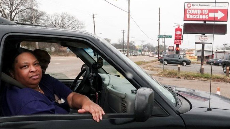 Sharon Catron Sharp waits in a long queue for Covid testing in Memphis, Tennessee