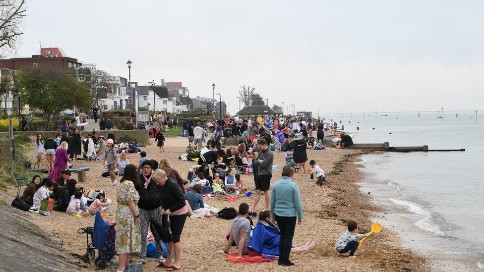 People enjoy the weather on Chalkwell Beach, Southend, Essex. Picture date: Wednesday March 31, 2021.