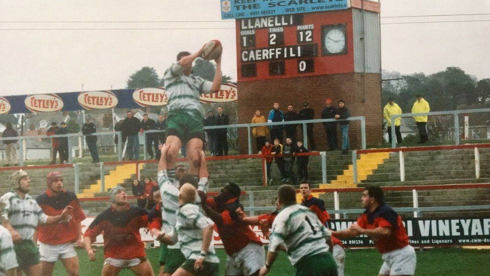 Antony playing rugby