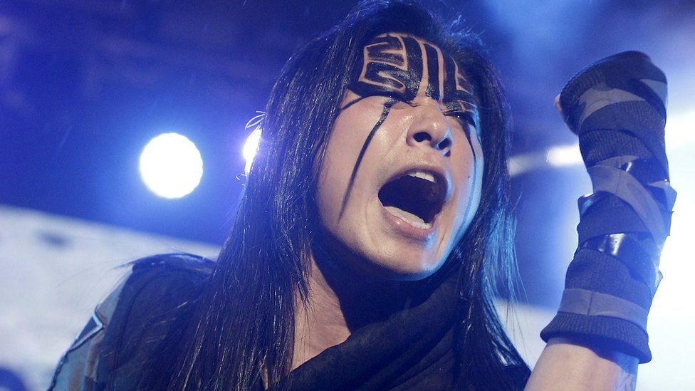 Freddy Lim, a candidate to the 2016 legislative election and singer of death metal band Chthonic, performs during a concert to boost his campaign in Taipei, Taiwan, December 26, 2015.