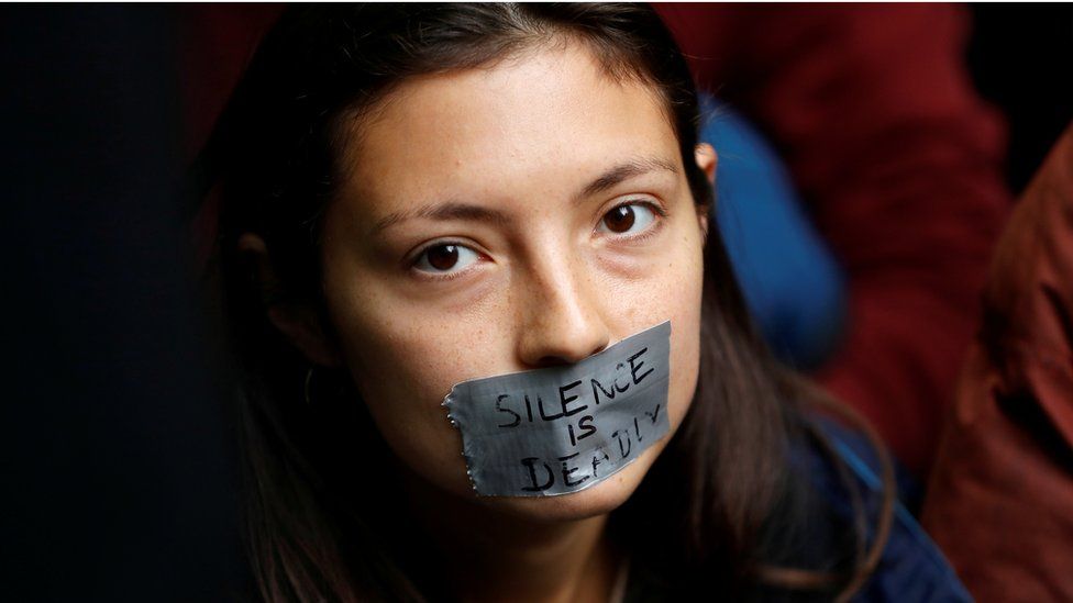 A protester outside the BBC during an Extinction Rebellion protest in London