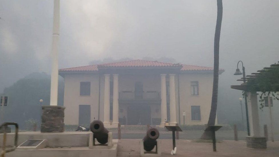 Smoke obscures the old Lahaina courthouse as wildfires driven by high winds destroy a large part of the historic town of Lahaina, Hawaii, U.S. August 9, 2023.