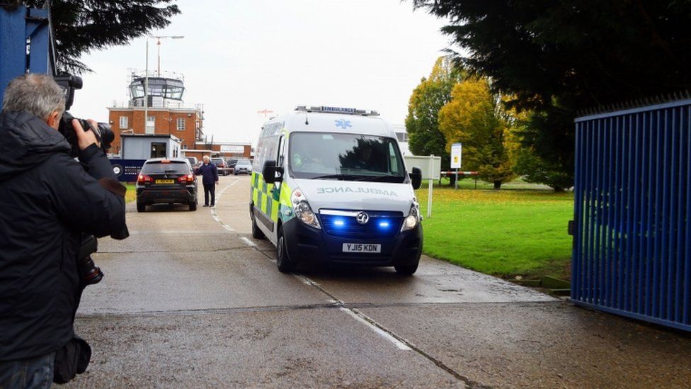 An ambulance arrived at London's Biggin Hill Airport ahead of Mr Aamer's return