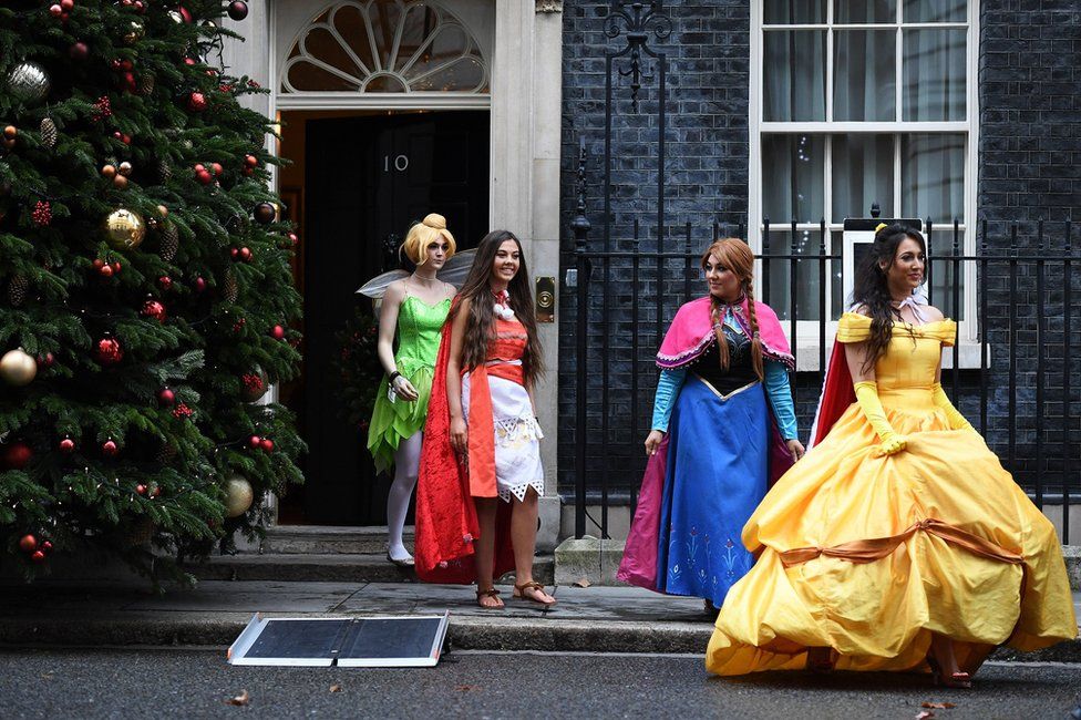 Costumed characters emerge from 10 Downing Street
