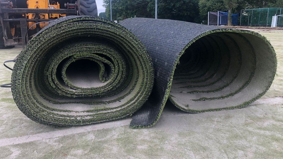 The rolled up artificial pitch