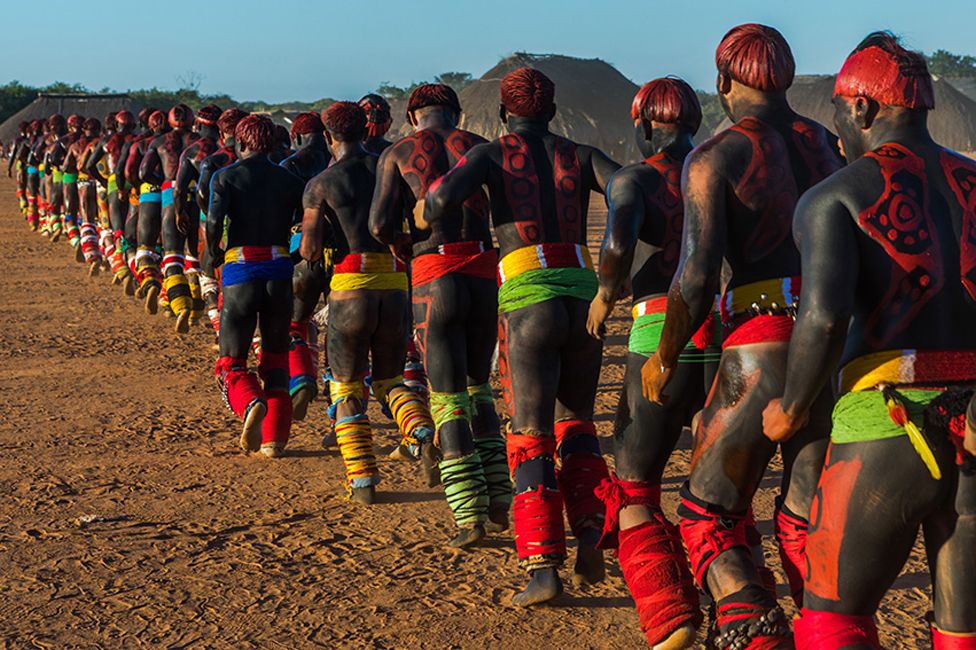 Young men participate in the martial art called Huka-huka