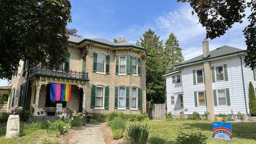 A rainbow flag on a home in Paris