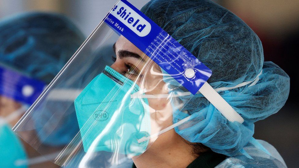Healthcare worker wearing full protective equipment in Australia