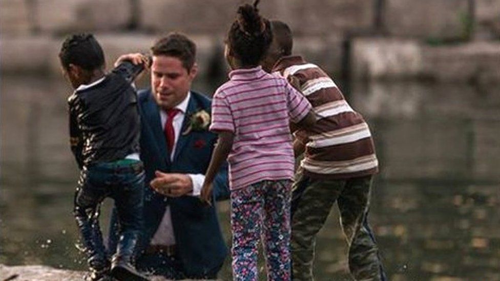 Groom Clayton Cook saved a boy from drowning