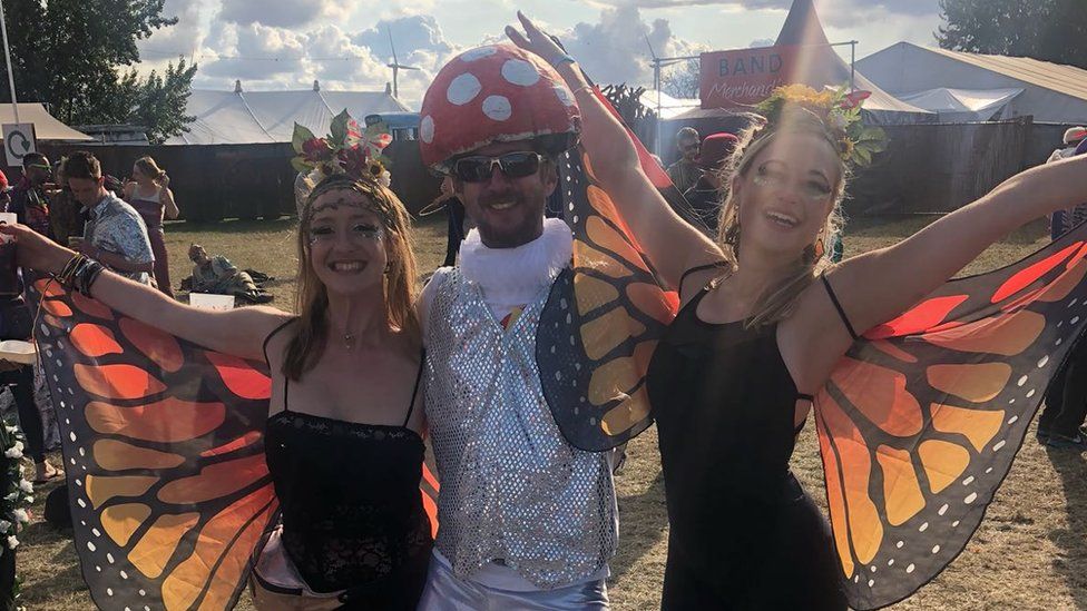 A group of people dressed in costumes at Shambala Festival