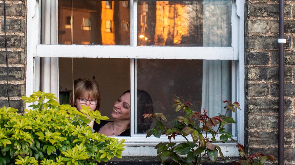 Family at a window