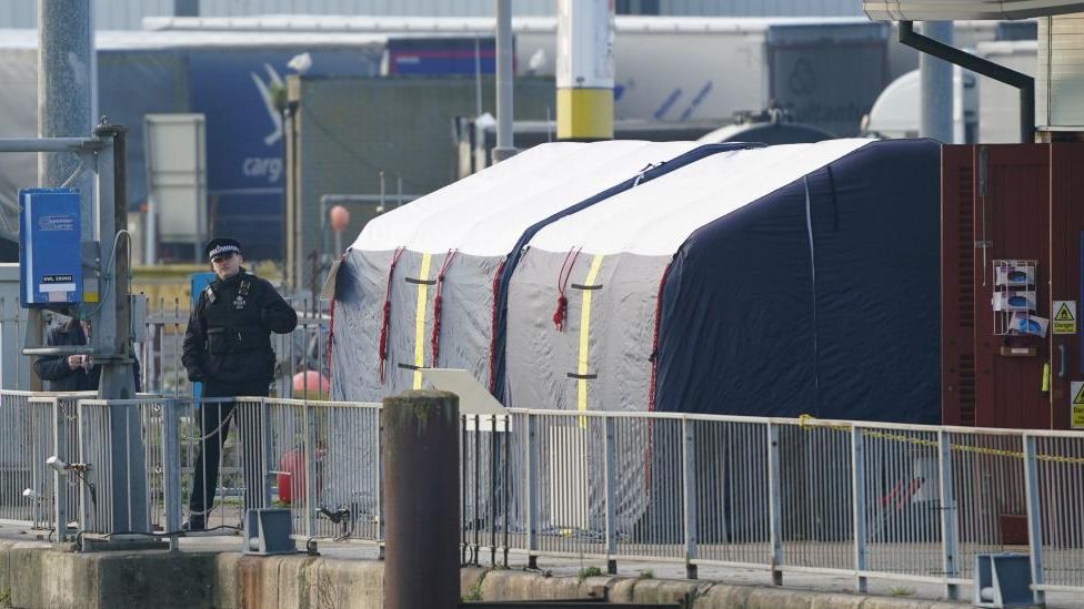 Forensic tents erected at the RNLI station at the Port of Dover following a large search and rescue operation