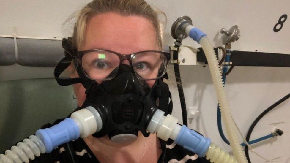 Rachel Hext wearing an oxygen mask