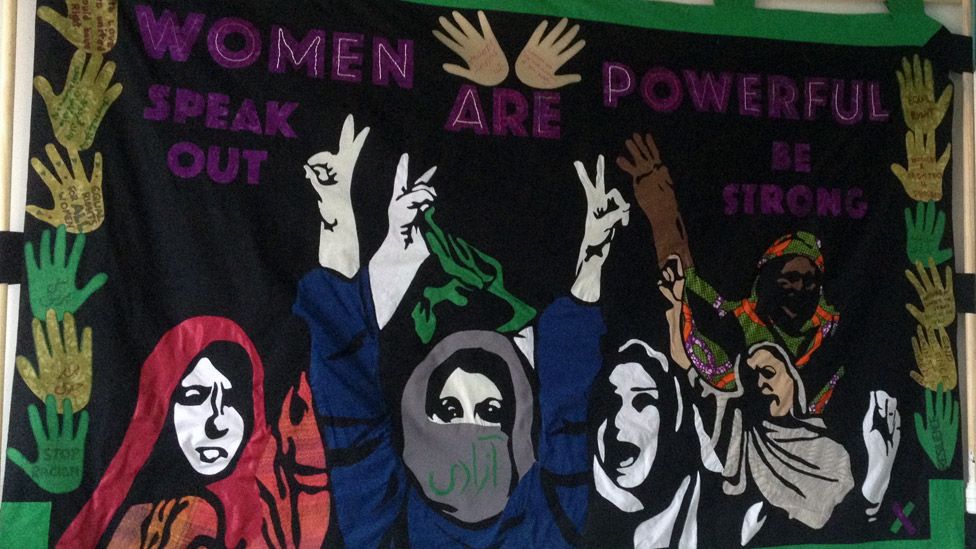 The Scottish Refugee Council created a banner with women from the refugee community in Glasgow, working with Iranian artist Paria Goodarzi