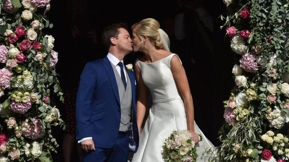Declan Donnelly kisses his wife Ali Astall following their wedding ceremony