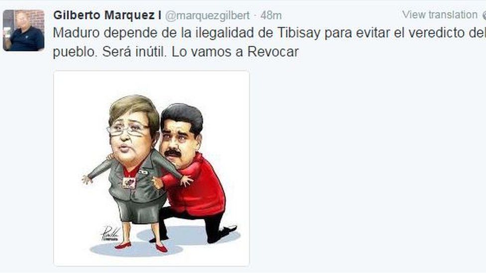 Tweet reading "Maduro relies on the illegality of Tibisay [Lucena] to sidestep the verdict of the people. It will be useless. We will recall him." and showing Tibisay Lucena as a puppet being manhandles by Nicolas Maduro.