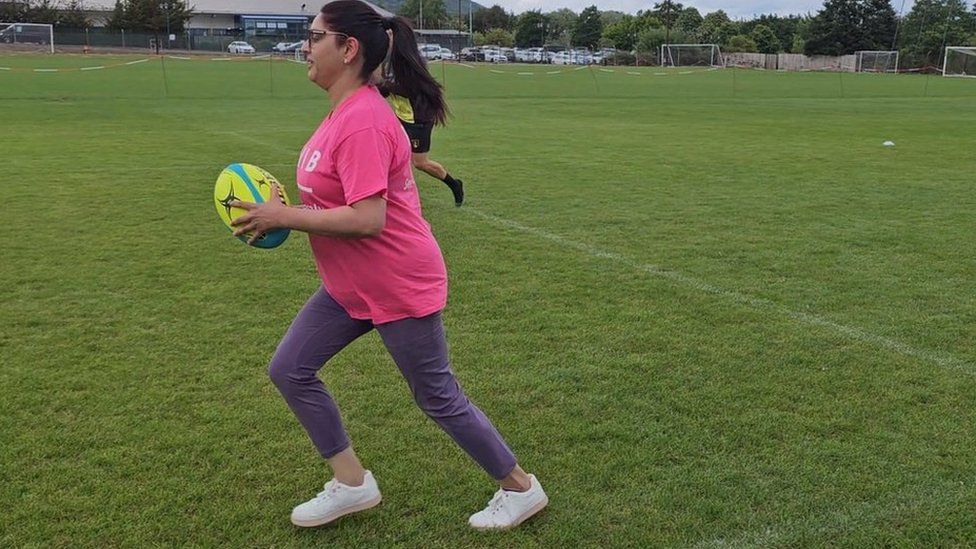 Mona playing visual impairment rugby