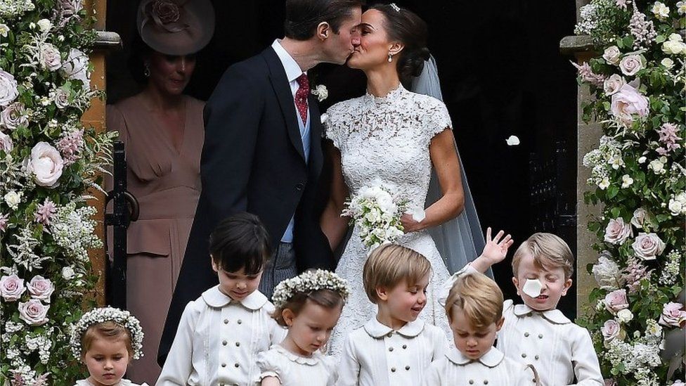 Pippa Middleton kisses her new husband James Matthews