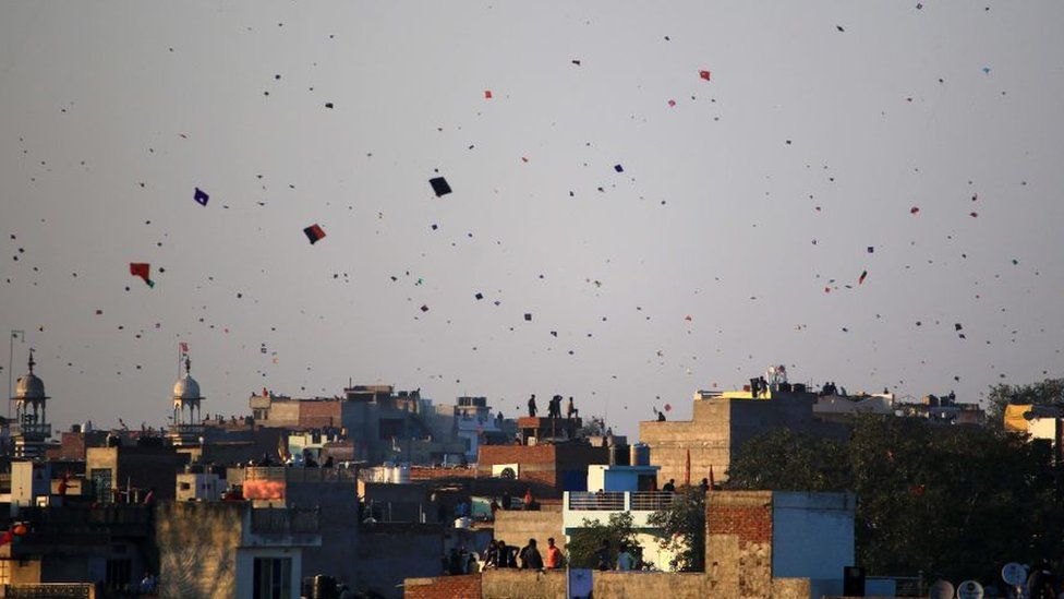 Hundreds of kites fill the sky over the Indian city of Jaipur