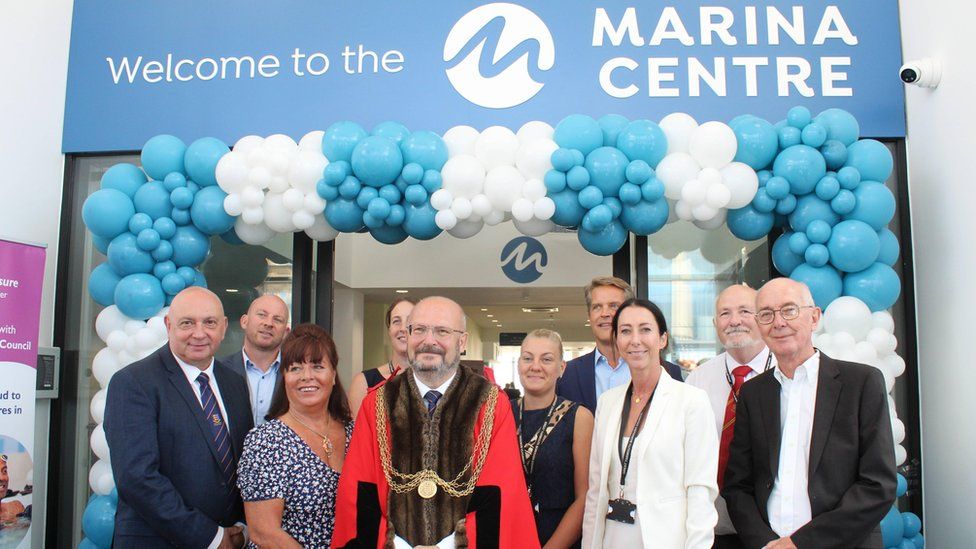 People standing in front of the new Marina Centre when it opened