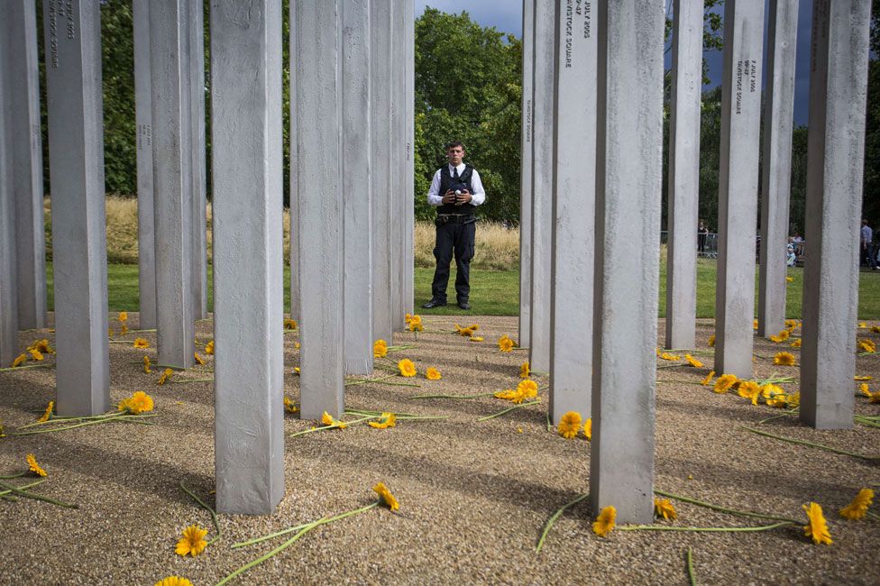 A policeman stands at the memorial to 7/7 in Hyde Park