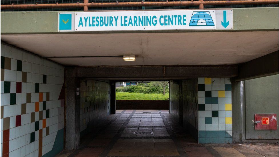 A sign is pictured indicating the route to the Aylesbury Learning Centre through a Wendover housing block at the Aylesbury Estate in Walworth on 27 April 2023 in London, United Kingdom. The Aylesbury Estate, one of the largest housing estates in Europe when built between 1963-1977, has been subject to a phased regeneration process since 2005.