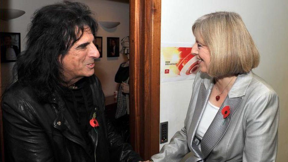 Theresa May meeting the rock star Alice Cooper in 2010