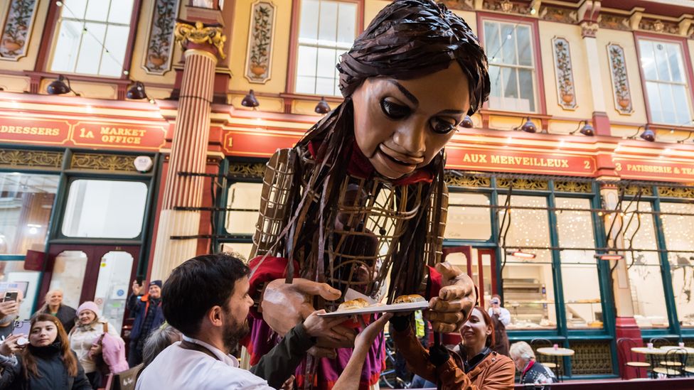 The bakers serve her up some delicious pastries in Leadenhall Market