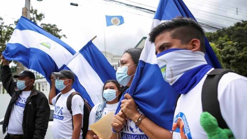 Nicaraguans exiled in Costa Rica take part in a protest outside the Inter-American Court of Human Rights to demand the government of Nicaragua"s President Daniel Ortega the liberation of political prisoners and to reject the November 7 general election, in San Jose, Costa Rica August 27, 2021.