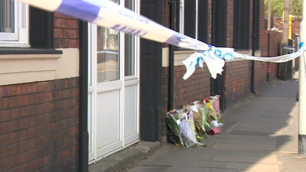 Floral tributes left at the scene