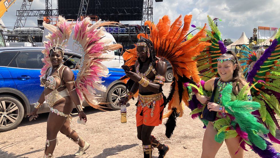 Carnival dancers in feathered costumes