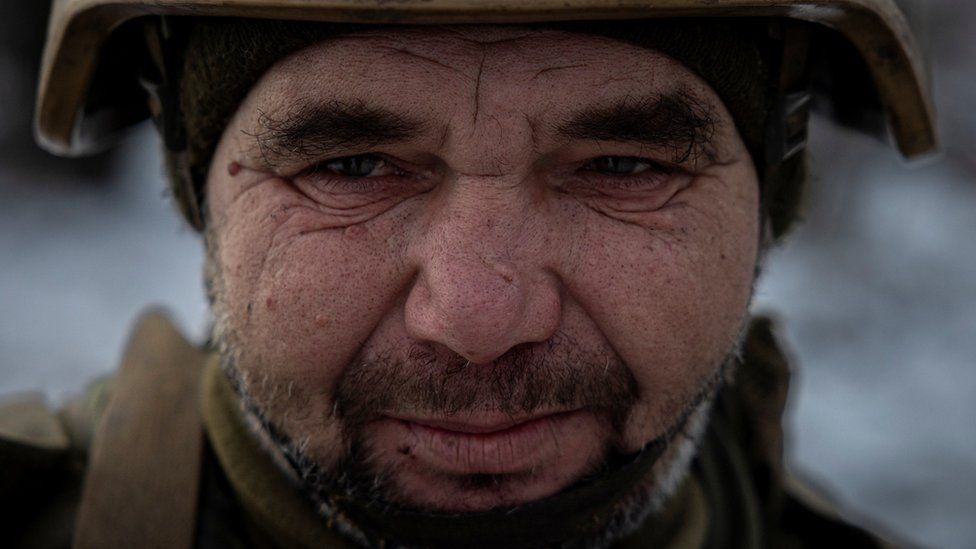 A Ukrainian serviceman of the 93rd separate mechanized brigade attends a Christmas Day service near the front line in the Donetsk region as Ukrainians celebrate their first Christmas according to a new calendar, amid Russia’s attack on Ukraine, December 25, 2023.