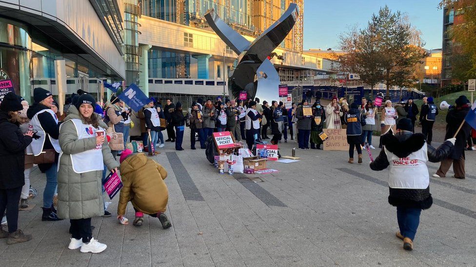 Dozens gathered outside the Queen Elizabeth Hospital in Birmingham
