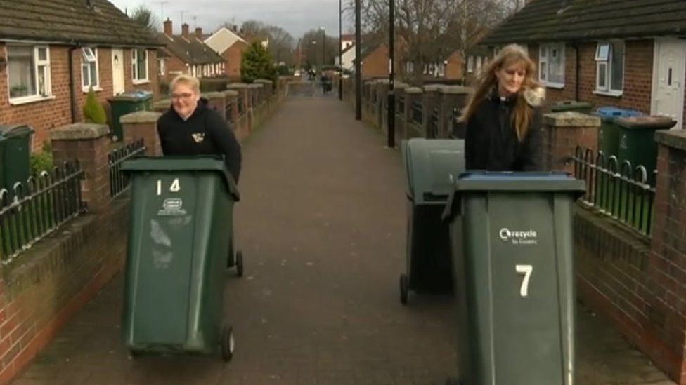 Dee Hodgson and Melinda Anthony moving bins