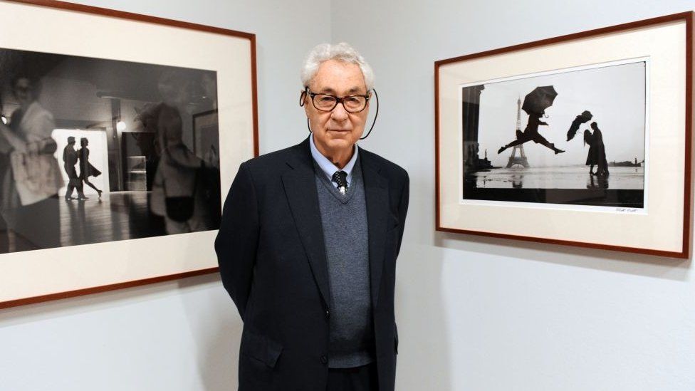 Erwitt poses in 2010 at La Maison Europeenne de la Photographie, Paris, where 130 of his images went on display