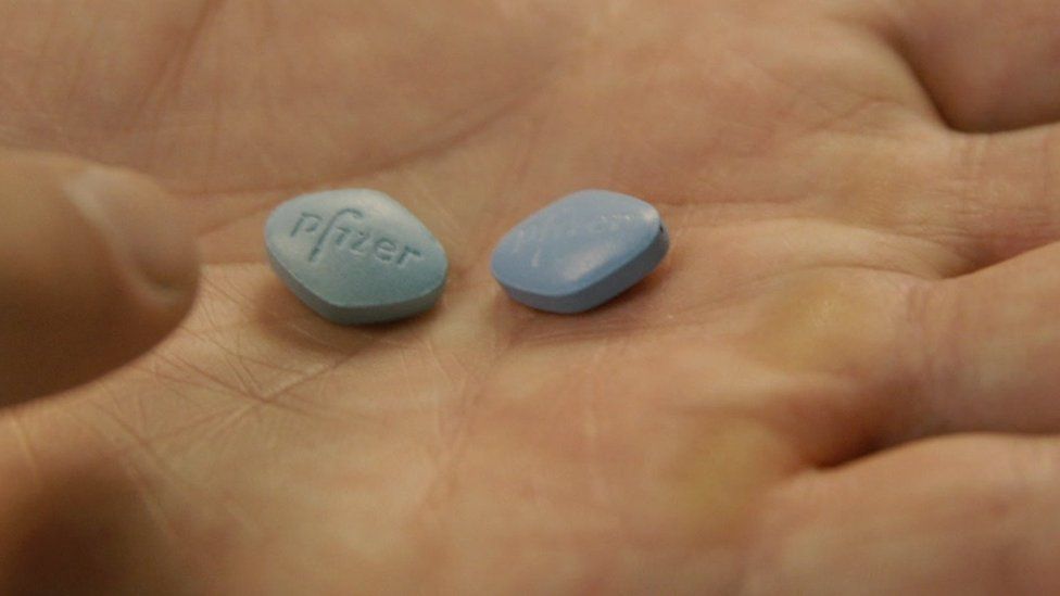 A fake and real Viagra tablet