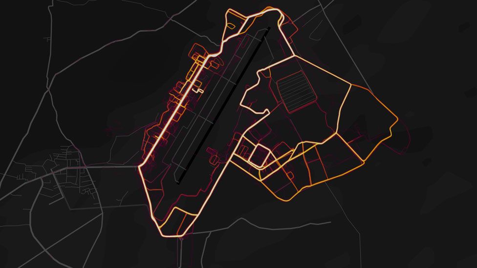 Red "heat lines" are arrayed neatly in the pattern of roads and streets on a dark black map