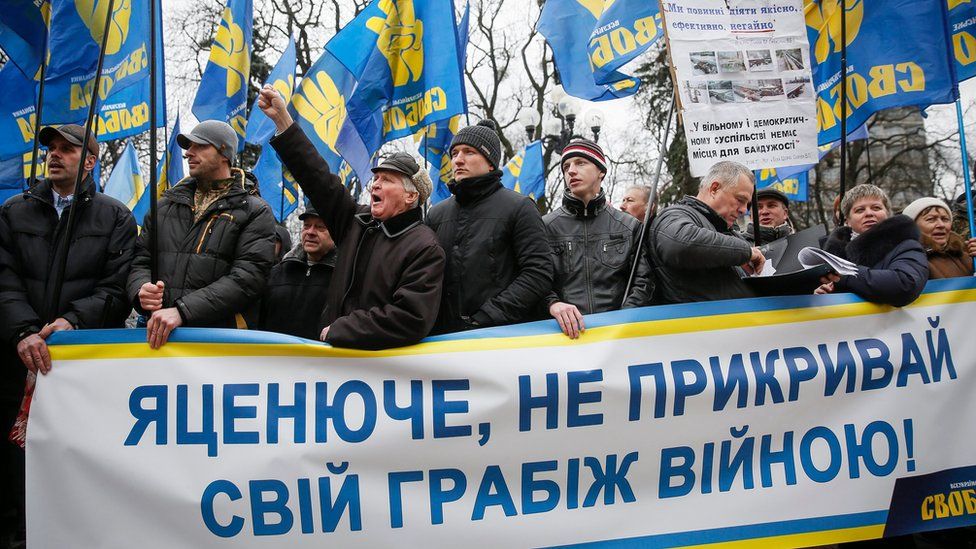 Ukrainian supporters of nationalist Svoboda (freedom) party in protest demanding Yatsenyuk to step down