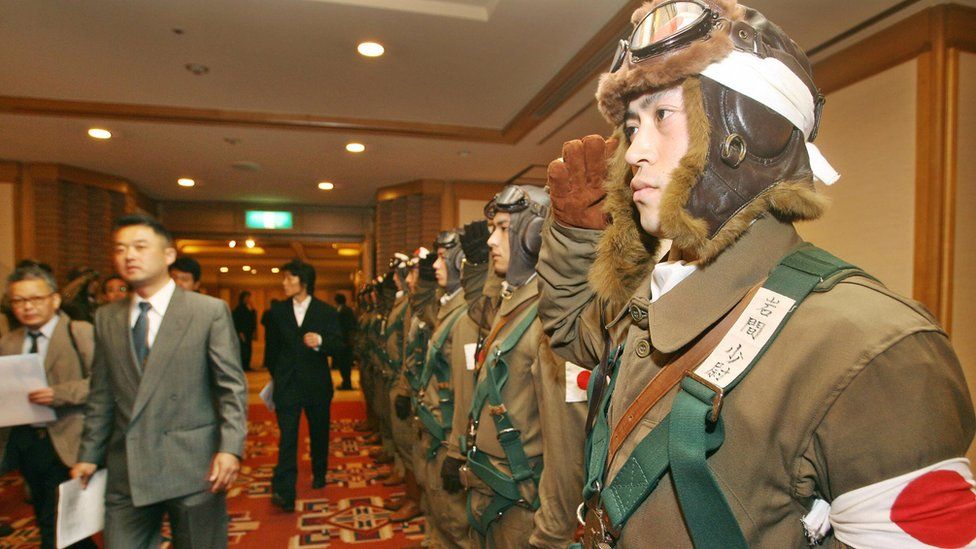Men dressed in kamikaze uniform as the then Tokyo Governor held a news conference to promote his movie "For Those We Love" in 2006