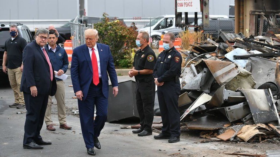 President Donald Trump, Attorney General William Barr and Acting Homeland Security Secretary Chad Wolf tour an area affected by civil unrest in Kenosha
