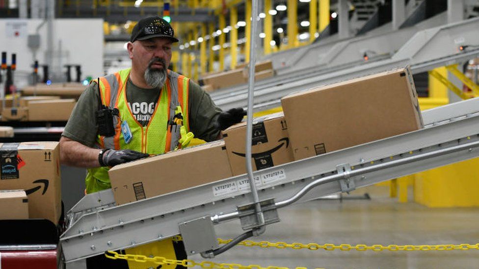A worker in an Amazon warehouse in Colorado