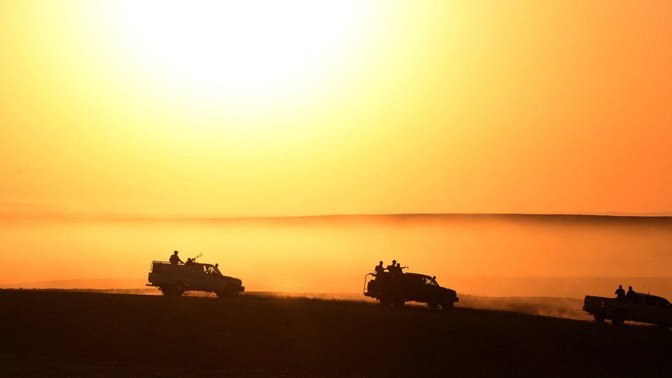 A convoy of Iraqi army and paramilitary Popular Mobilisation forces patrol the western part of Iraq's Nineveh province for remnants of the Islamic State (IS) group (12 October 2022)