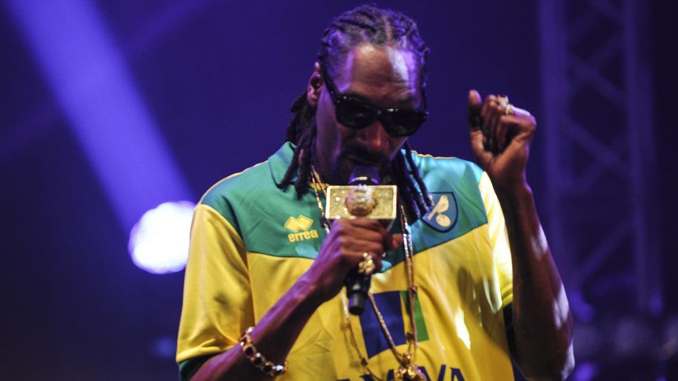 Snoop Dogg performing on stage
