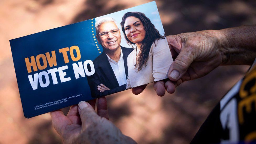 A 'How to vote No' pamphlet is being held by a No campaign volunteer on October 07, 2023 in Perth, Australia. A referendum for Australians to decide on an indigenous voice to parliament will be held on October 14, 2023