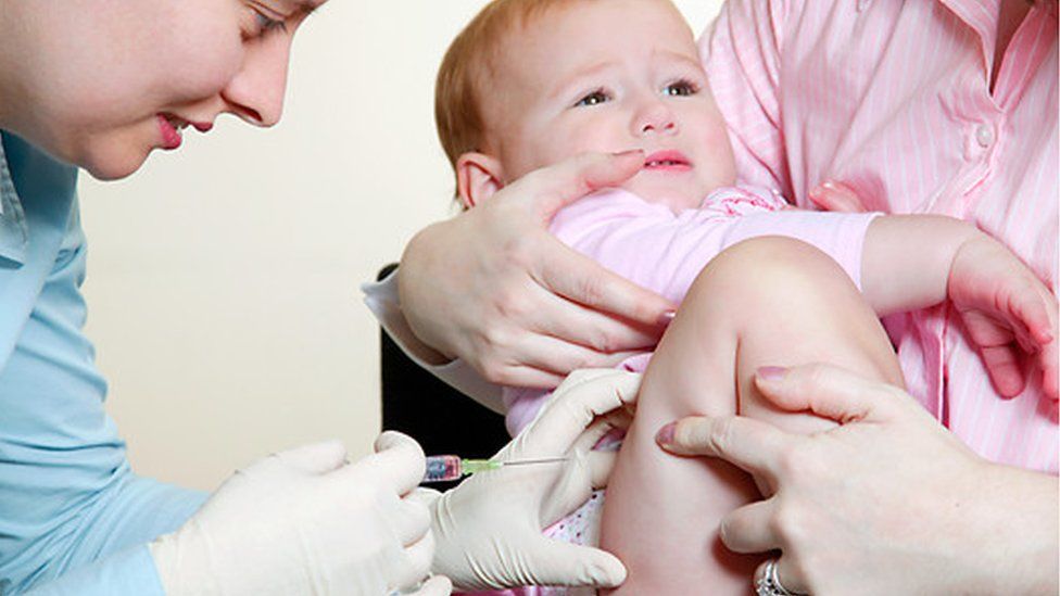 Baby being vaccinated against measles